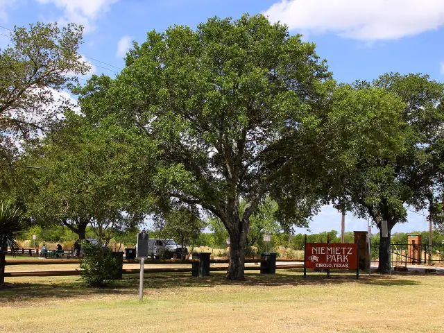 Niemietz Park entrance in Cibolo, Texas, shaded by live oak trees